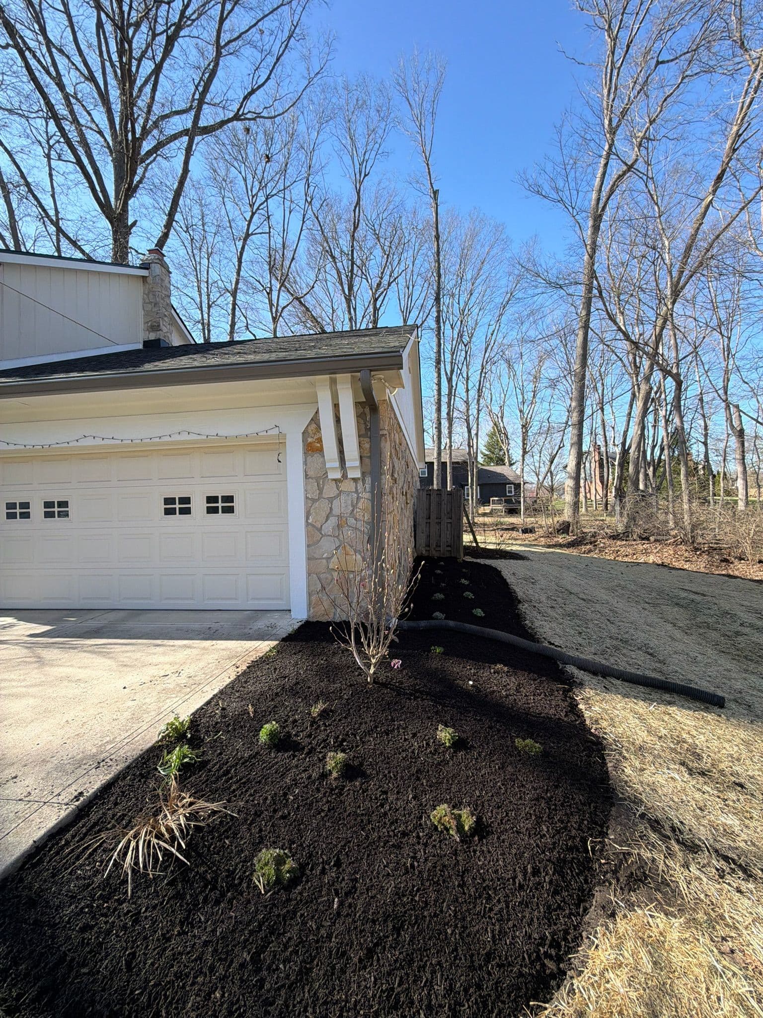 Project New Landscaping Beds, Plants, and Mulch Along a Home's Foundation image