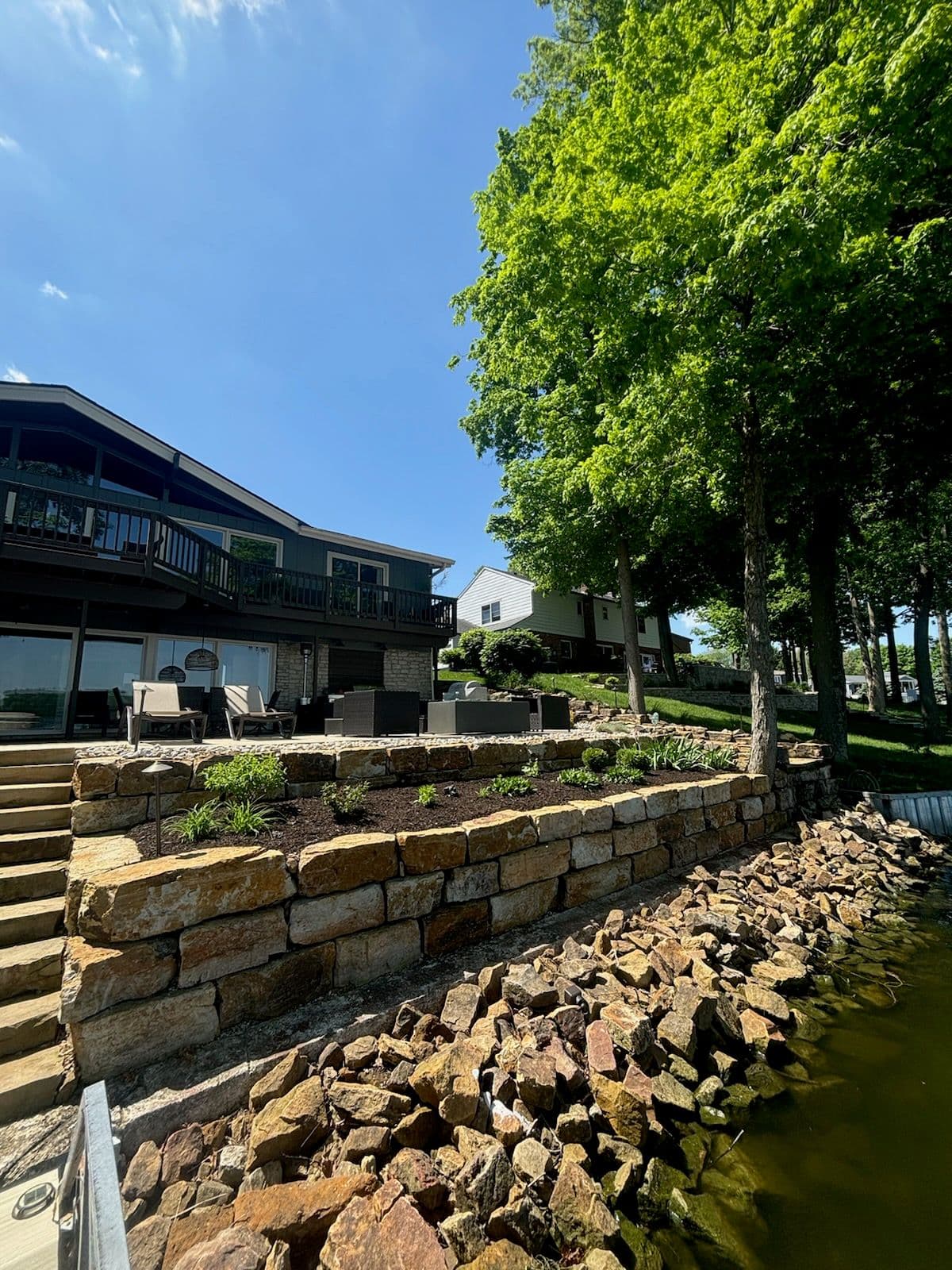 Project Stylish Retaining Wall Transformation in Lakeside Setting image