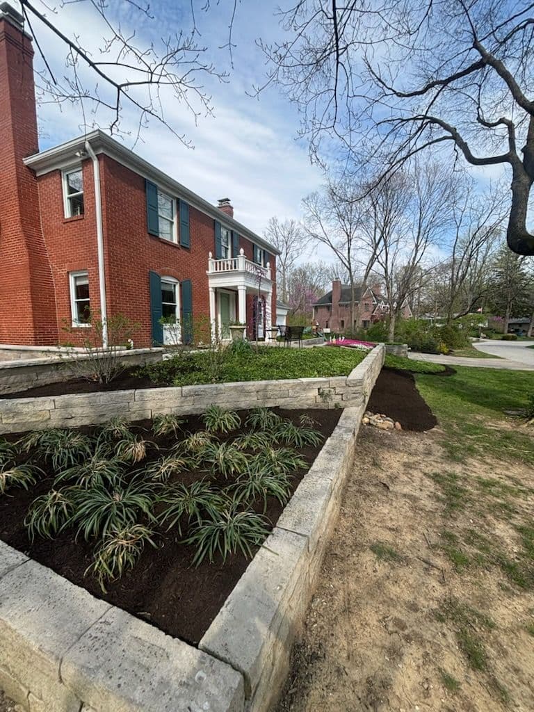 Project Vibrant Yard Makeover with Retaining Walls and Plant Design image