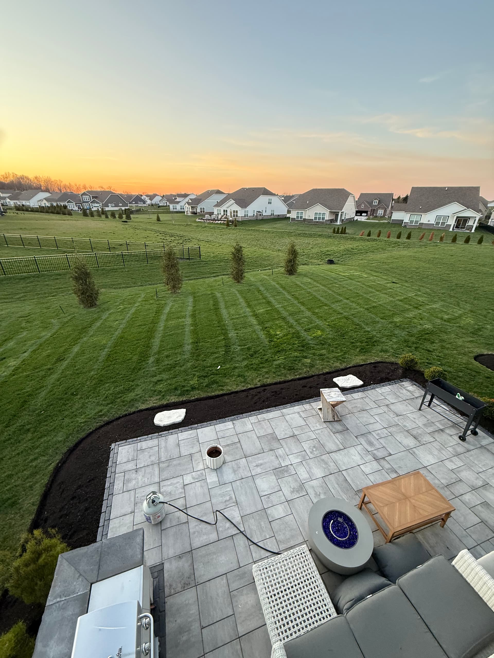Paver Patio, Fresh Mulch Beds, and Crisp Mow Lines Done Right image
