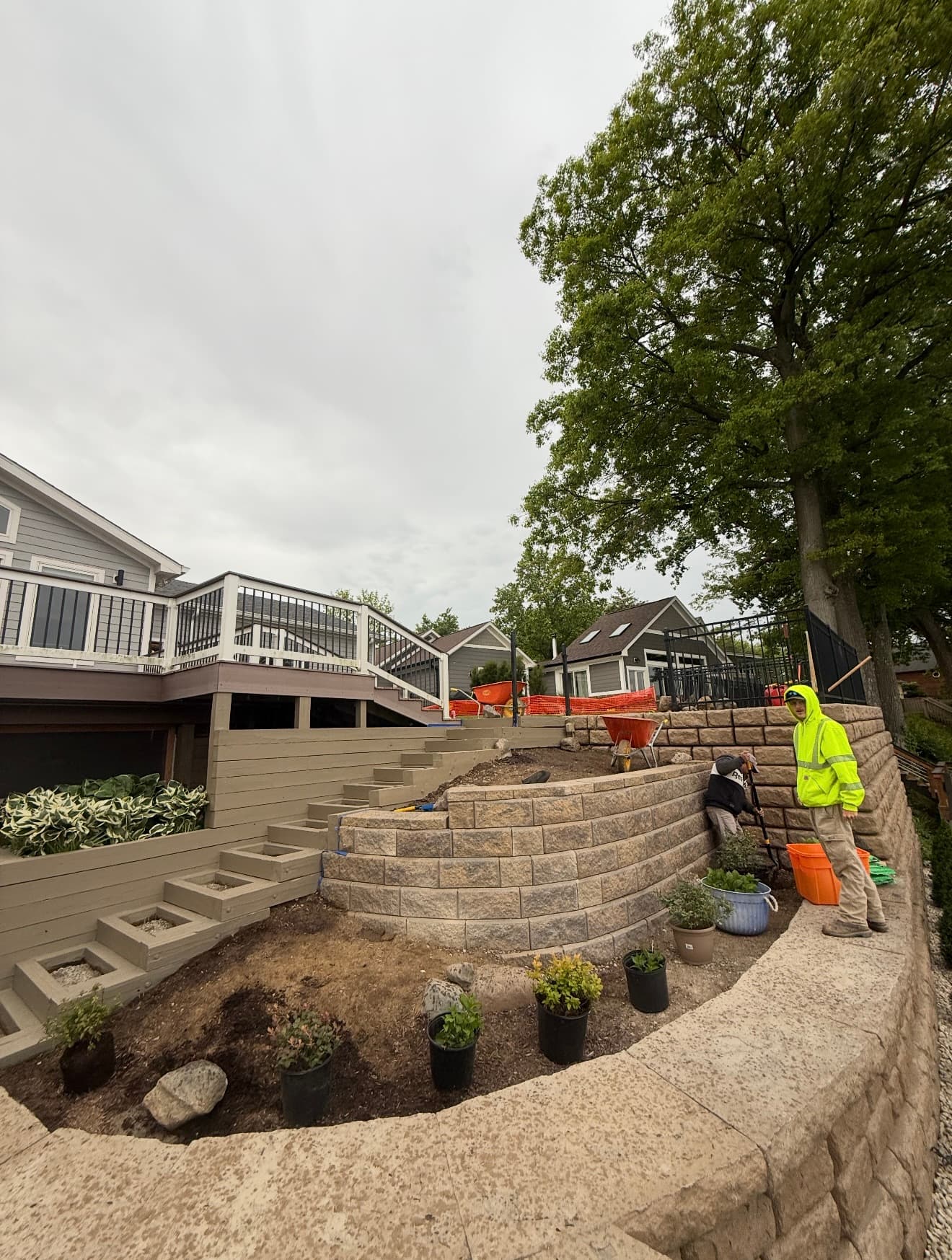 Retaining Wall Rebuild with Step Pavers and Lighting in Cicero IN image