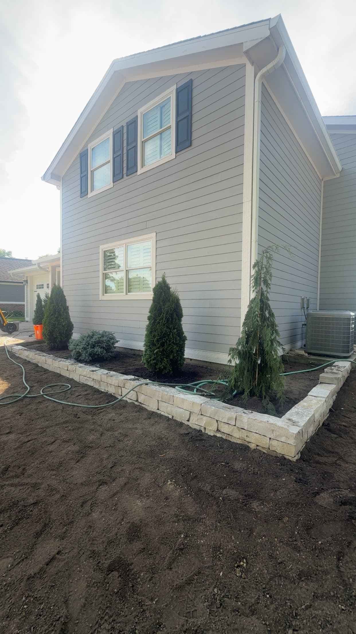 Retaining Wall Rebuild and Fresh Plantings in Cicero IN image