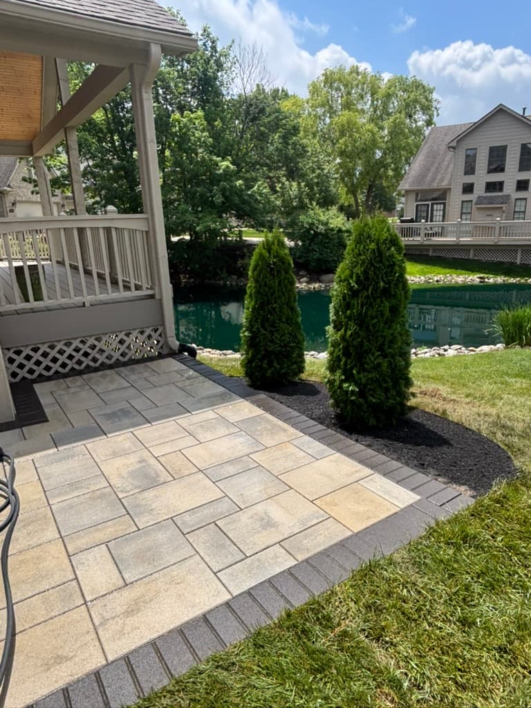 Fresh Landscape Beds and Arborvitaes Added to a Carmel Backyard image