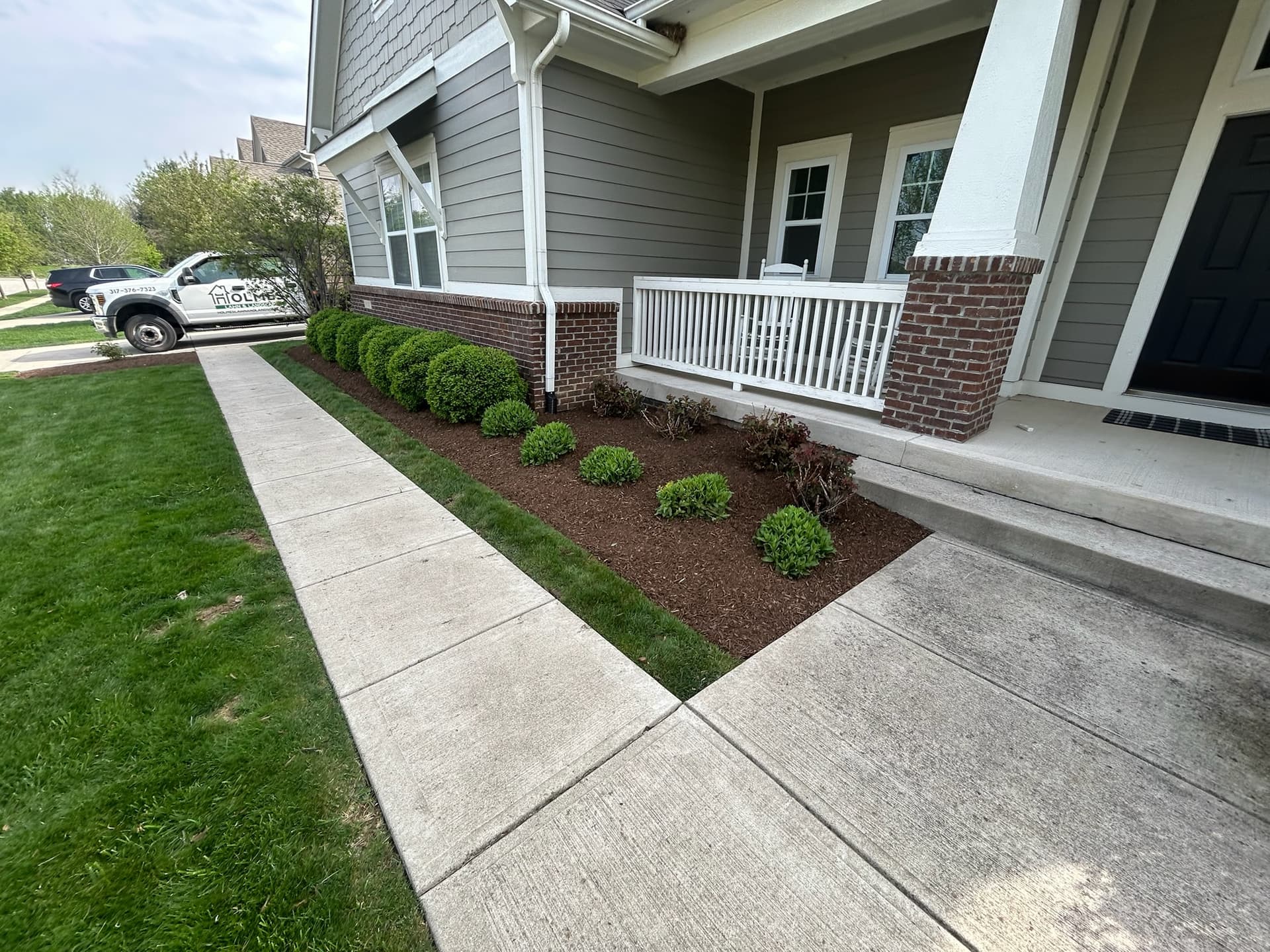 Front Bed Cleanup and Fresh Shrub Install That Actually Looks Sharp image